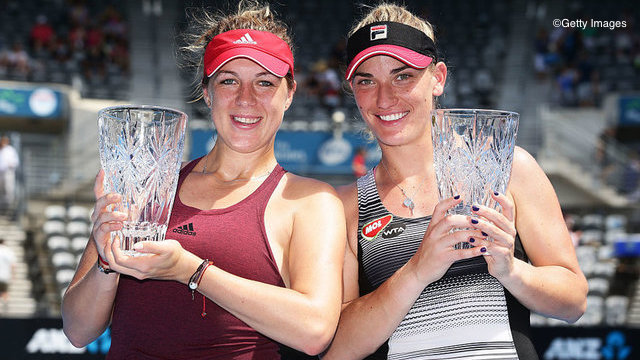 SYDNEY, AUSTRALIA - JANUARY 13: Anastasia Pavlyuchenkova of Russia (L) and Tmea Babos of Hungary (R) pose with the winners trophies after defeating Sania Mirza of India and Barbora Strycova of Czech Republic in the Womens Doubles Final during the Sydney International at Sydney Olympic Park Tennis Centre on January 13, 2017 in Sydney, Australia. (Photo by Matt King/Getty Images)