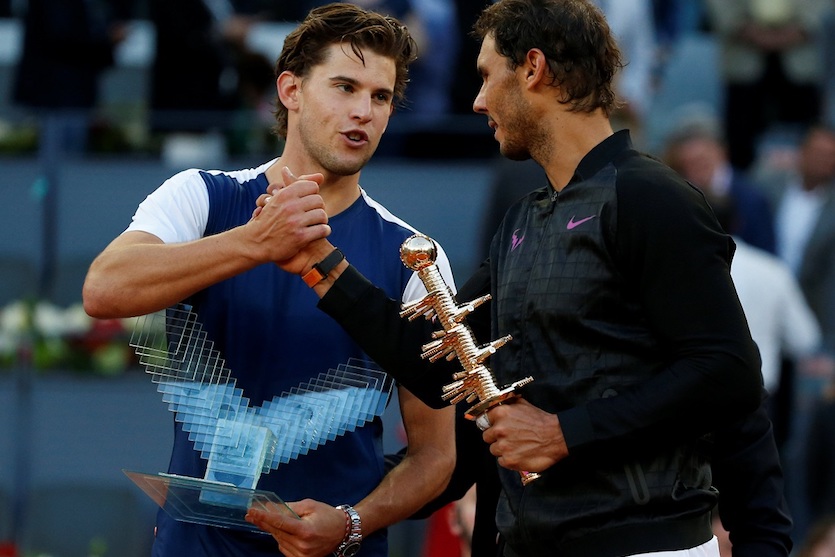 Tennis - ATP 1000 Masters - Madrid Open - Men's Singles Final - Dominic Thiem of Austria v Rafael Nadal of Spain - Madrid, Spain - 14/5/17 - Nadal and Thiem shake hands after posing with their trophies at the end of the match. REUTERS/Susana Vera